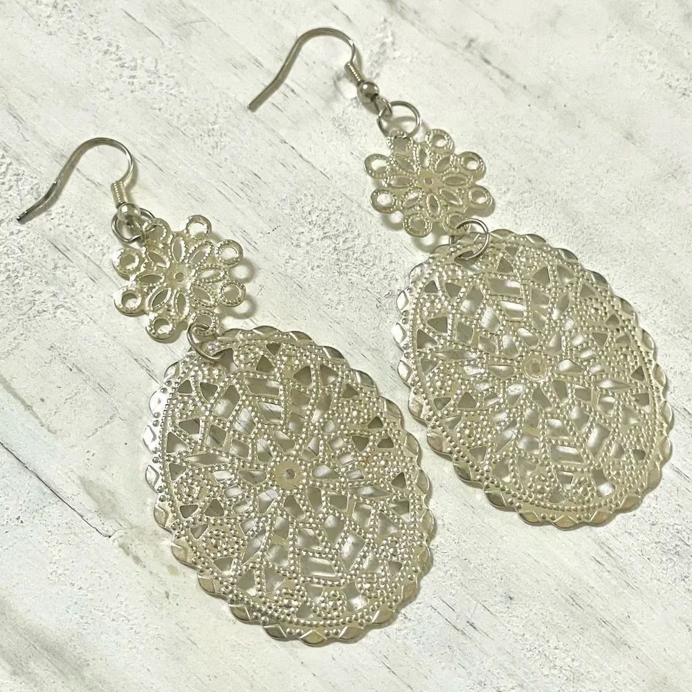 Silver tone statement earrings